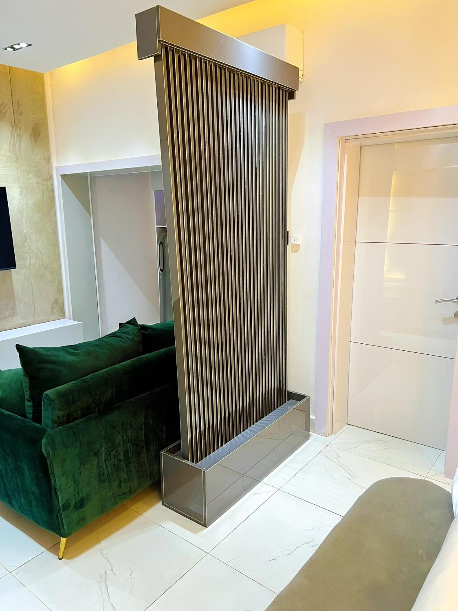 Austra Hotels And Apartments Maitama Абуджа Экстерьер фото