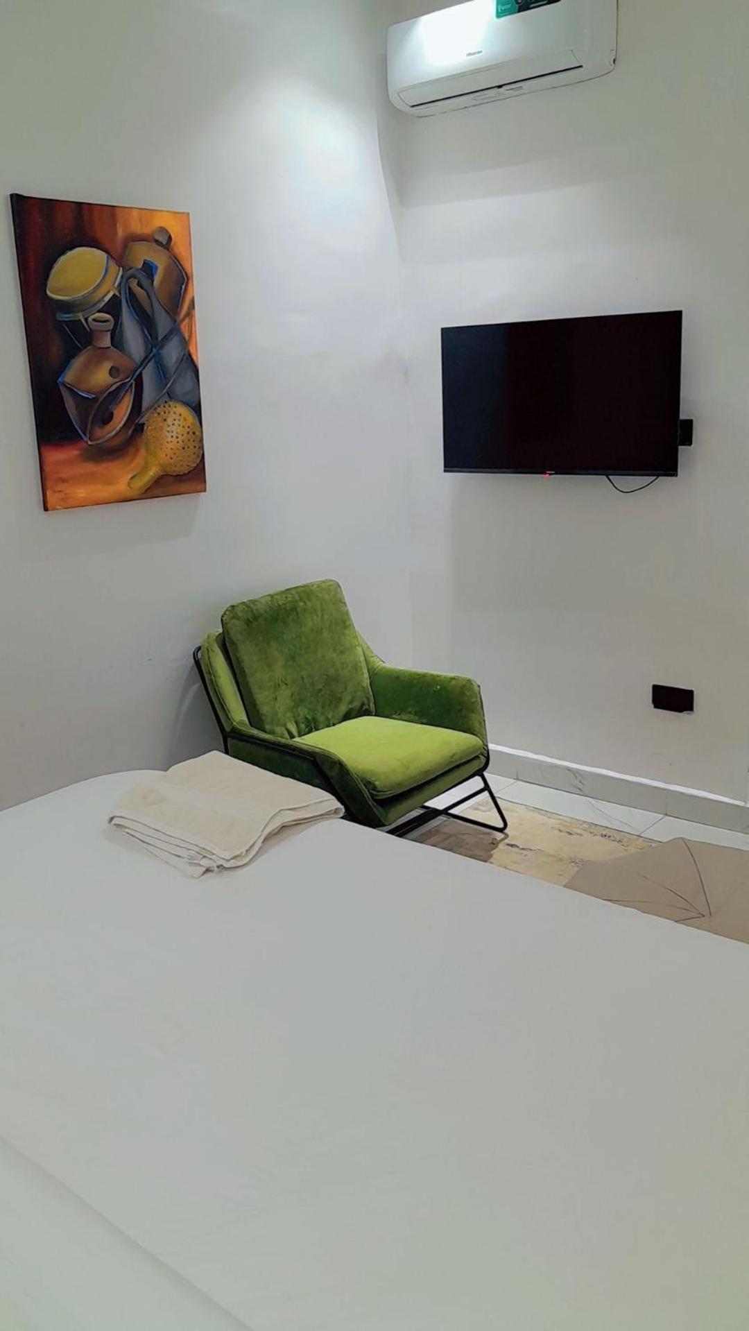 Austra Hotels And Apartments Maitama Абуджа Экстерьер фото